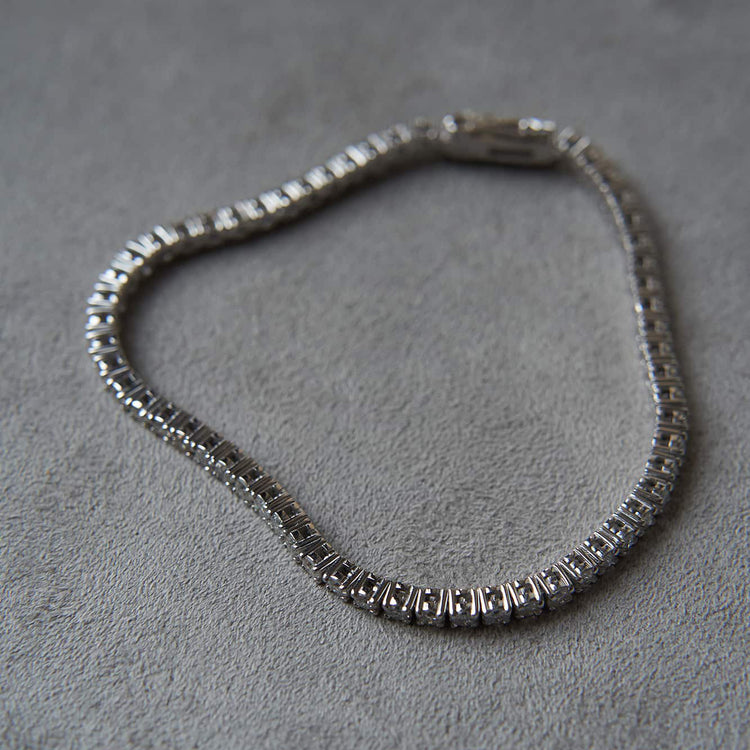 Золотий тенісний браслет з діамантами