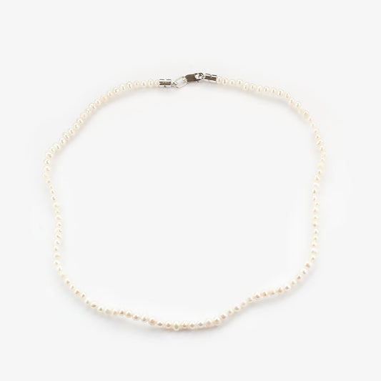 Золоте кольє з перлами