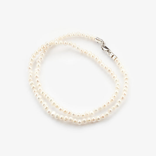 Золоте кольє з перлами