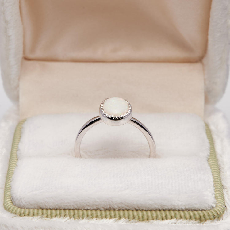 Золота каблучка з опалом