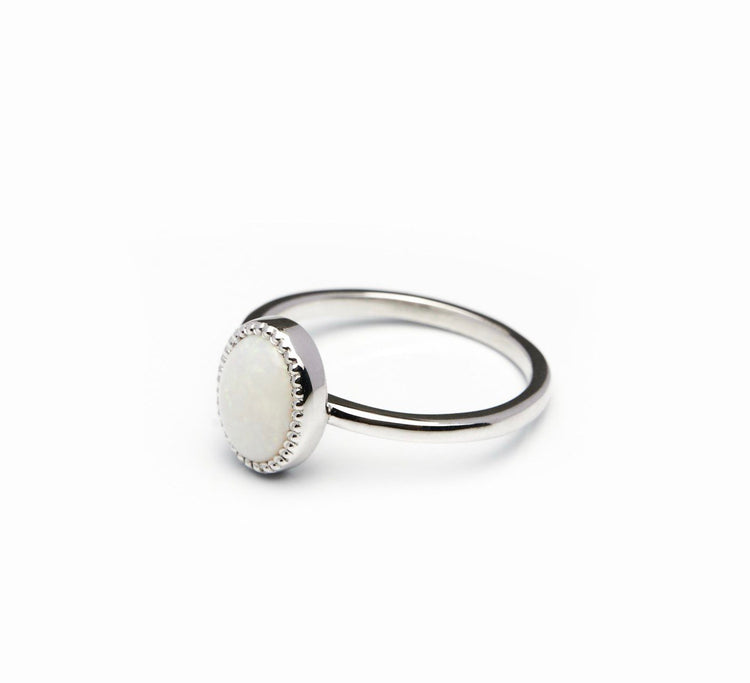 Золота каблучка з опалом